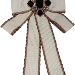 38 White bow and brooch