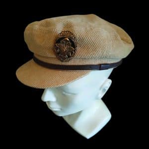 15 Fleur de capuchon cap and brooch