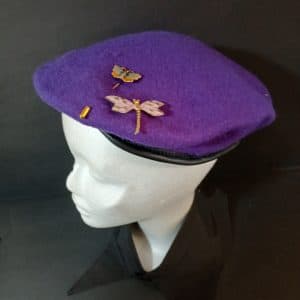 13 Butterfly pin and dragonfly brooches on pure wool purple beret
